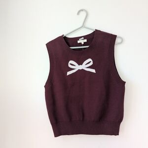 Burgundy Sleeveless Sweater with Bow Design